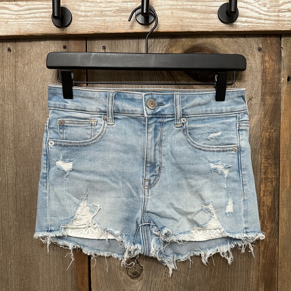 American Eagle Ne(x)t Level High-Waisted Denim Short Shorts in Destroyed Blue 4